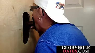 Mature daddy sucks black dick through gloryhole