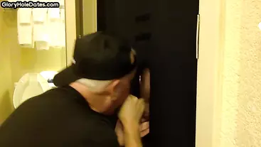 Gloryhole gay shows sucking skills while jerking dick