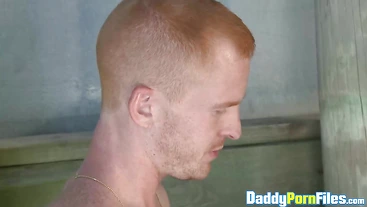 Hairy muscled dude Mike Dreyden takes a cumshot after being double dicked