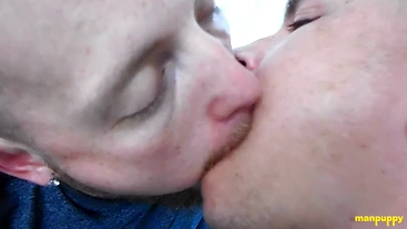 Two Hunks Slurps Each Others Tongue In An Intense Kiss