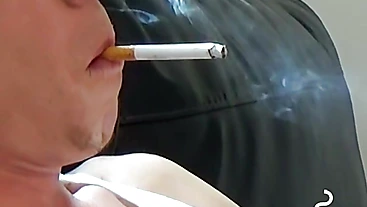 Blonde twink revealed his cock while blowing smoke