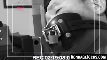 Bound Asian man tormented while struggling to break free