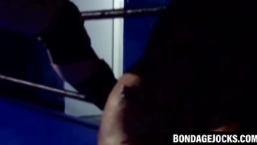 Inked hunk choked and dominated after losing a wrestling match
