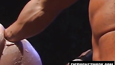 Sean Harris takes Francois Sagat's fist thrusts deep