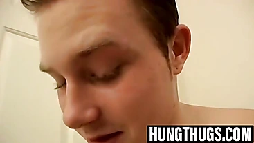 Billy and Damien stroke hard cocks in hallway