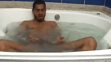 Brazilian jock uses dildo while shower stroking