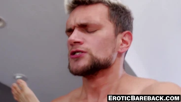 Athletic gay couple makes passionate bareback love