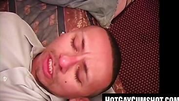 Austin Young's massive cock gets played with by kinky men in a hotel room