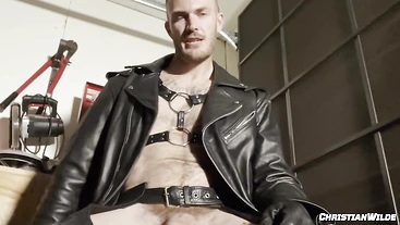 Watch Christian Wilde dominate and tease with his big cock in solo leather worship