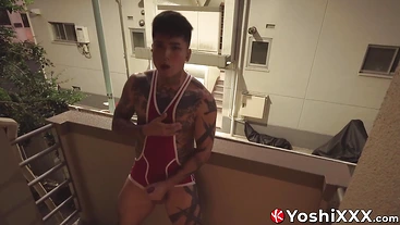 Yoshi Kawasaki steps out to the balcony and started stroking his pierced meat