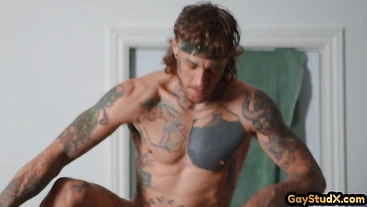 Tattoed twunk doggypounded by muscled BF