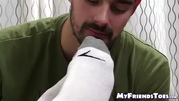 Amateur feet worshiper licks toes and feet with socks