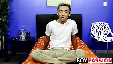 Asian twink strips naked and masturbates after an interview