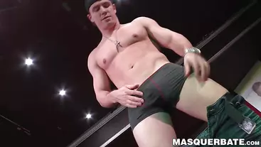 Muscular gay stripper takes off his clothes and masturbates